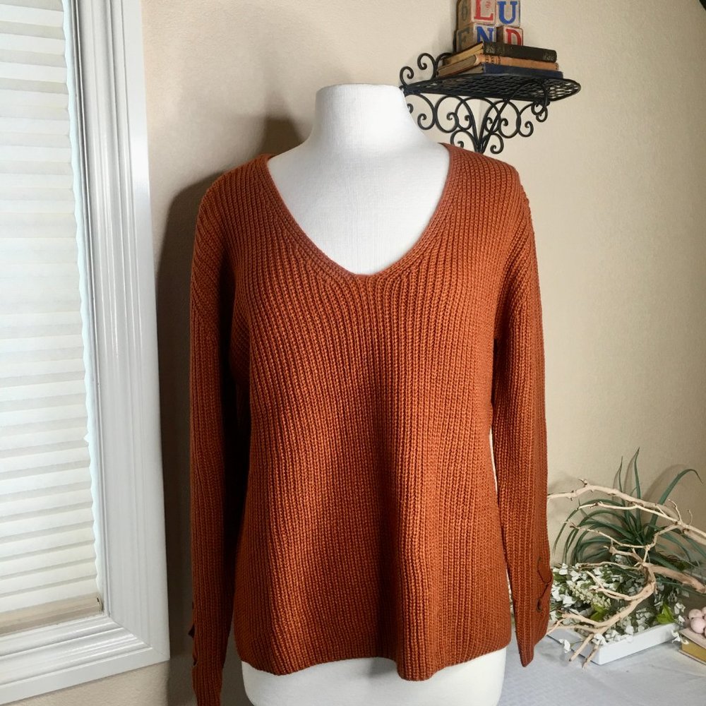 Cozy Rust Ribbed Sweater – V-Neck, Off-Shoulder Style & Crisscross Sleeve Detail